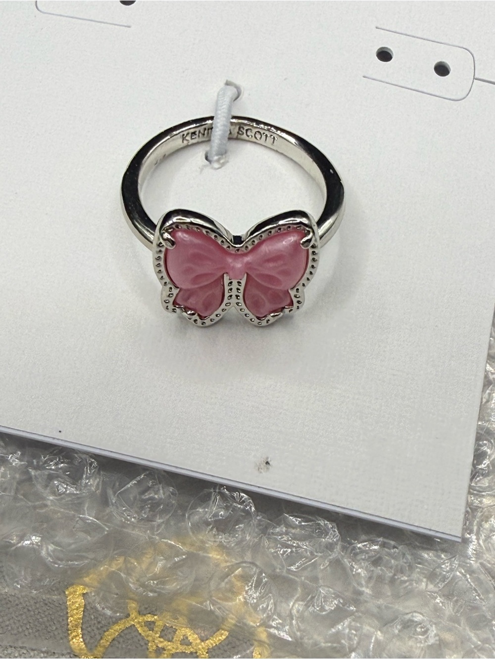 Kendra Scott Haley Bow Silver Band Ring in blush pink